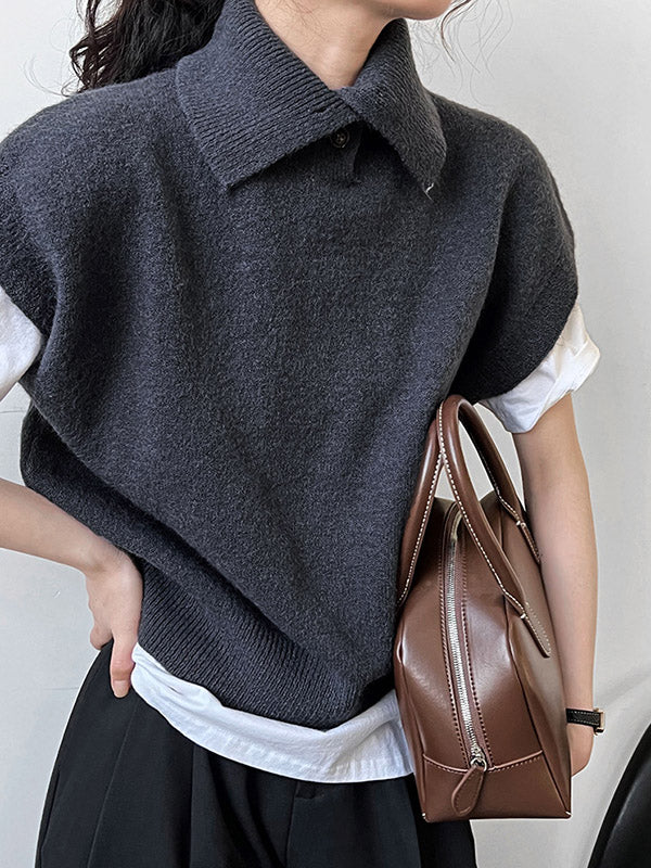 Haut sans manches ample à col montant et boutons