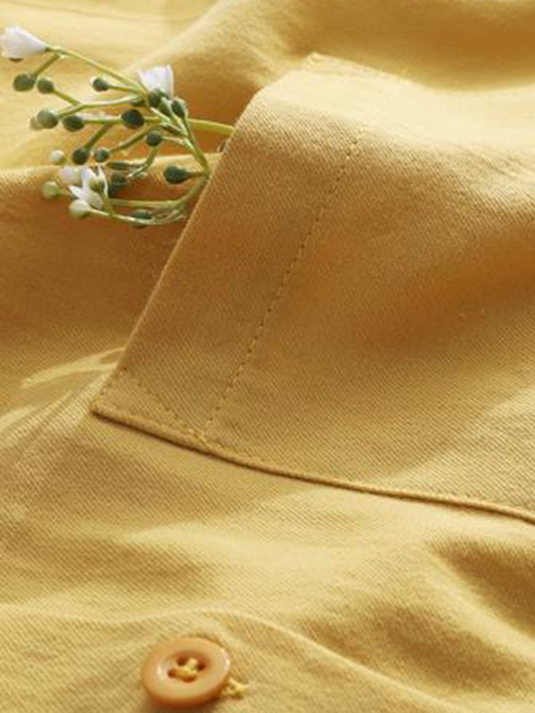 Chemises à manches longues et revers de couleur unie