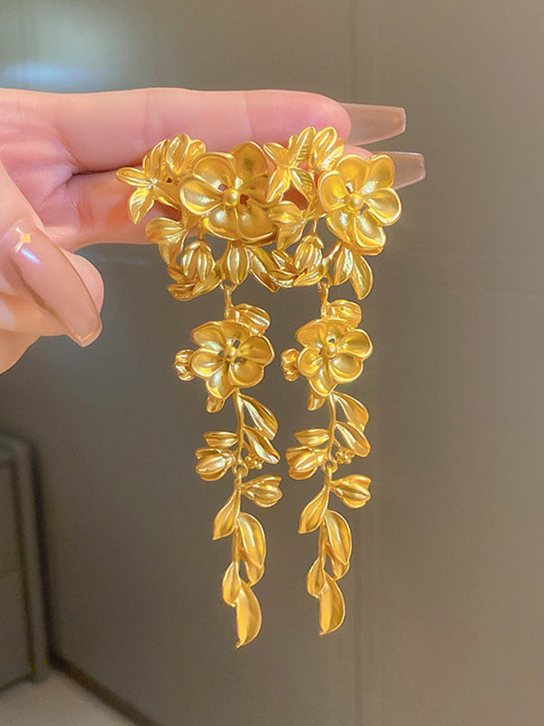 Boucles d'oreilles pendantes géométriques en forme de fleur de couleur unie