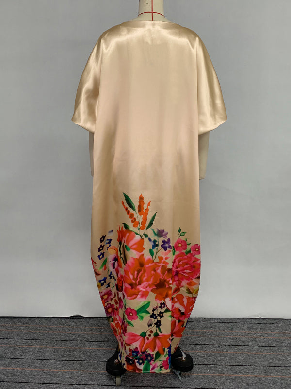 Robe longue trapèze à manches mi-longues et col en V, avec imprimé floral et fente sur le devant