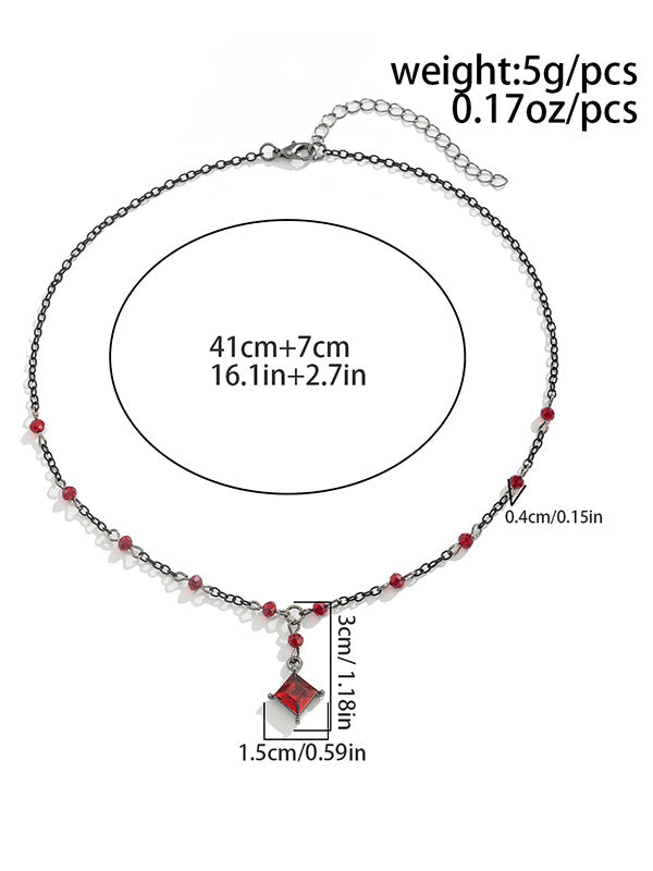 Colliers à pompons géométriques et accessoires