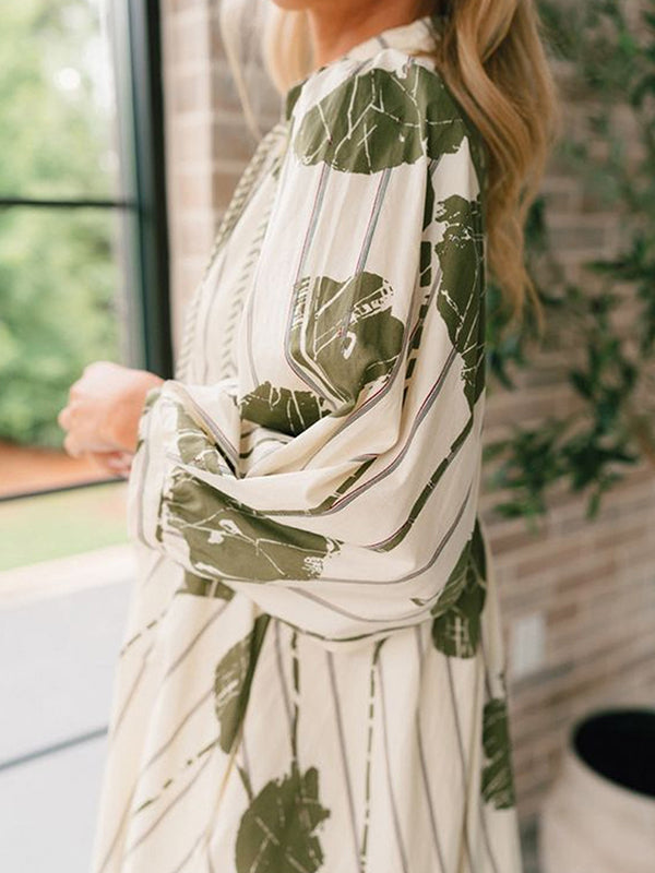 Hoch taillierte, langärmelige, bedruckte Minikleider mit V-Ausschnitt und Bindeband