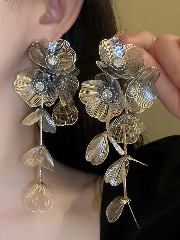 Boucles d'oreilles pendantes géométriques en forme de fleur avec pierres du Rhin