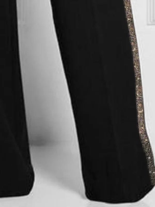 Pantalon taille haute ample à poches boutonnées de couleur unie