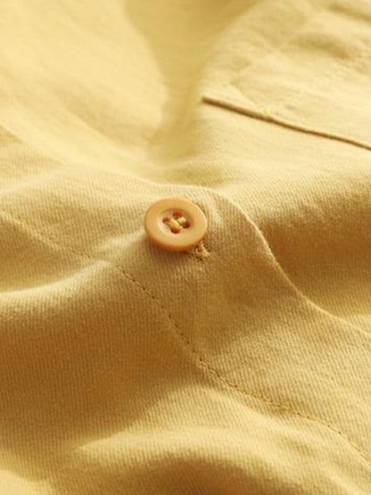 Chemises à manches longues et revers de couleur unie 