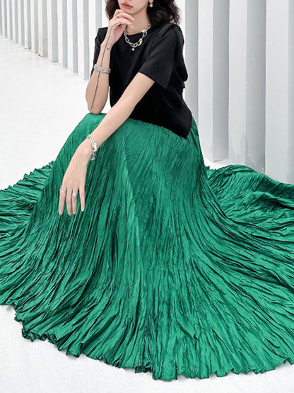 Jupes trapèze plissées taille haute à coupe irrégulière de couleur unie 