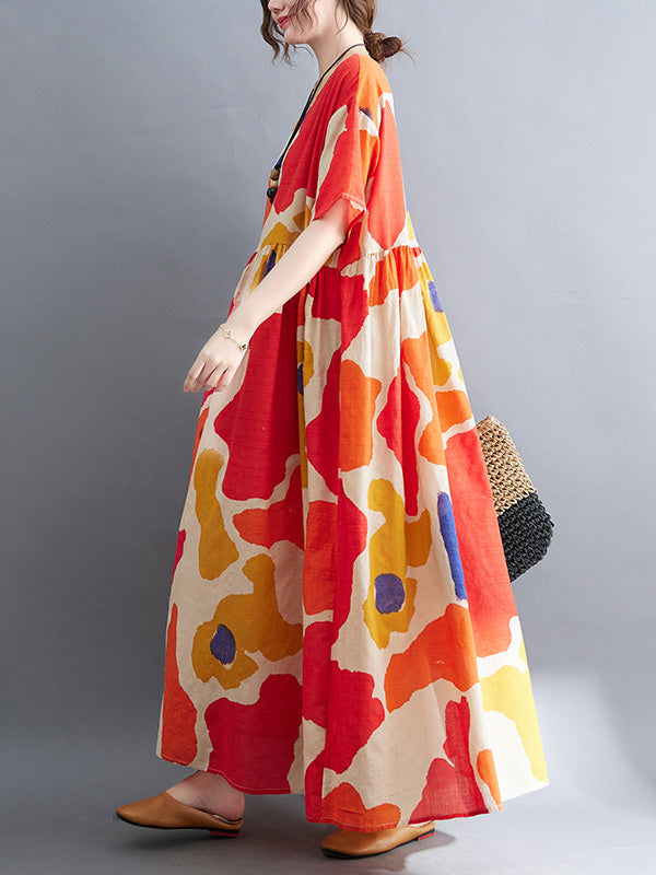 Künstlerische Retro-Kurzarm-Midikleider mit lockerem Kontrastfarbdruck und Rundhalsausschnitt 