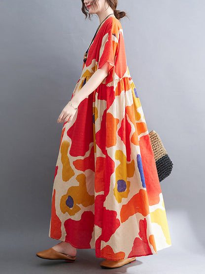 Künstlerische Retro-Kurzarm-Midikleider mit lockerem Kontrastfarbdruck und Rundhalsausschnitt 