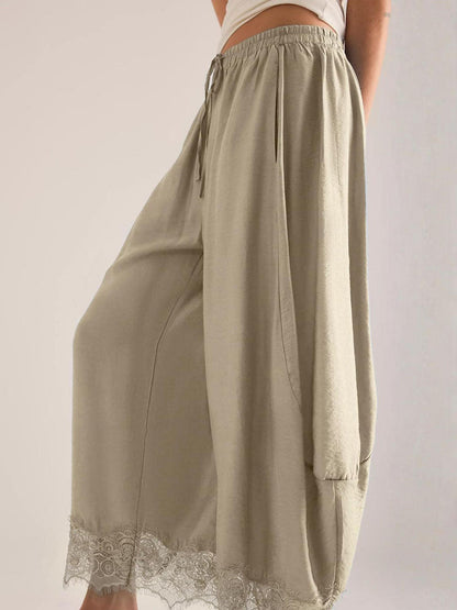 Split-Joint Solid Color Pockets Elasticity Drawstring Wide Leg Loose Trousers Pants