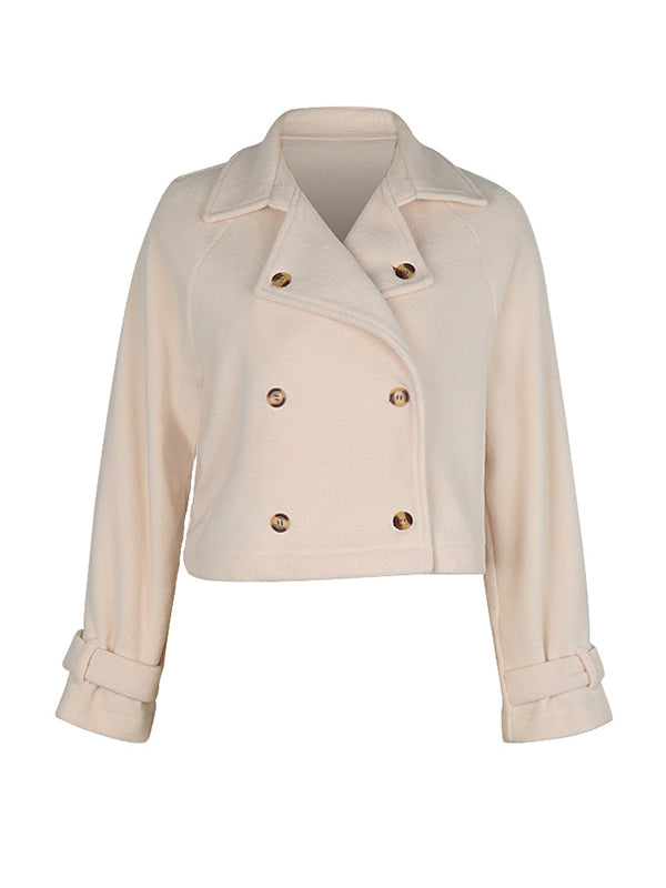 Langärmlige, locker geknöpfte Oberbekleidung mit geteiltem Kragen und Revers 