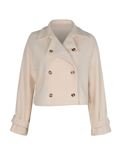 Langärmlige, locker geknöpfte Oberbekleidung mit geteiltem Kragen und Revers 