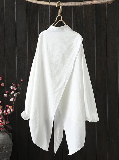 Chemisier ample noir et blanc à manches longues et coupe irrégulière 