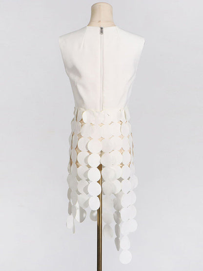 Haut sans manches à pois, couleur unie, col rond, pompons fendus 