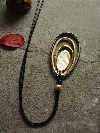 Collier long cercle multicouche 