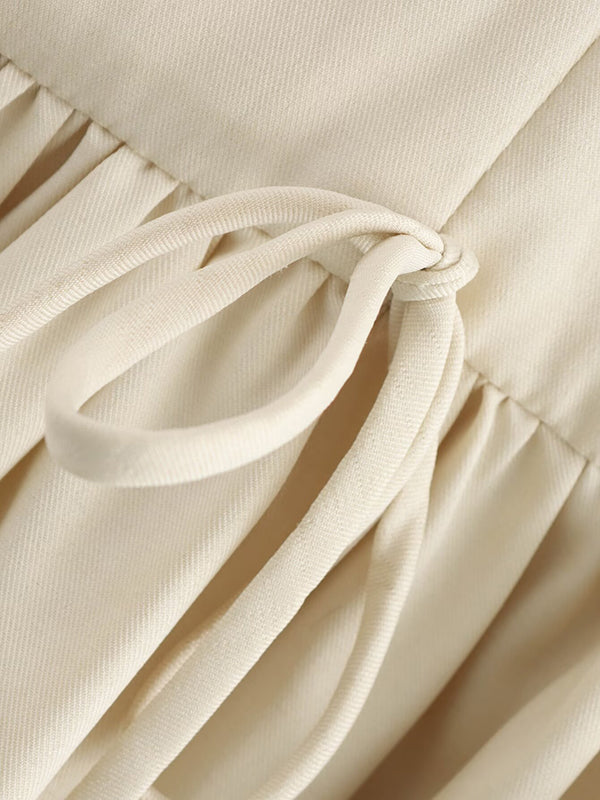 Mini-robe trapèze ample plissée de couleur unie avec fermeture éclair et col rond 