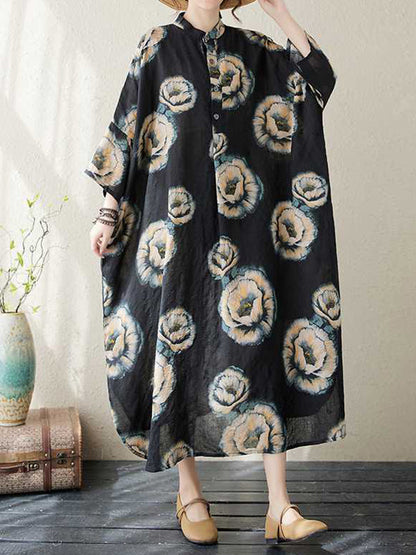 Robe mi-longue ample à manches trois-quarts et col montant, boutonnée et imprimée de fleurs 