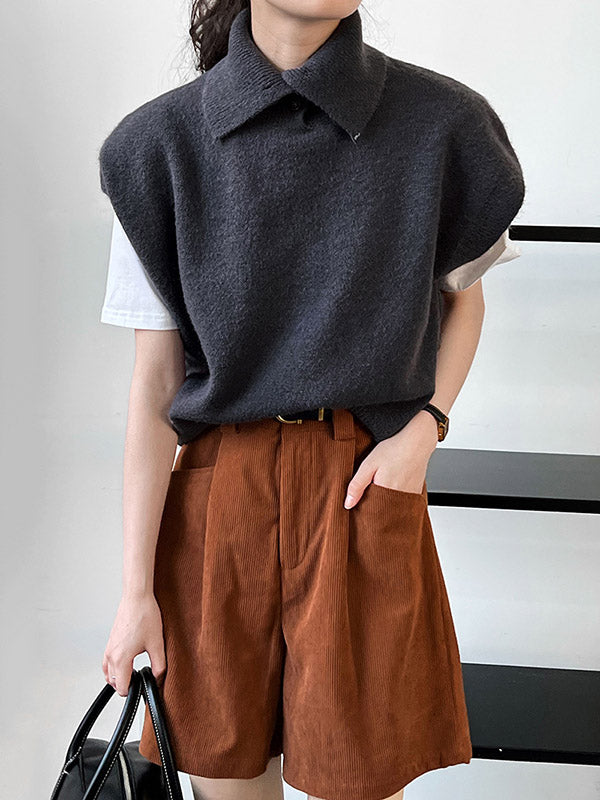 Haut sans manches ample à col montant et boutons 