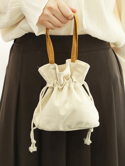 Mini sacs à cordon de serrage et à joint fendu 