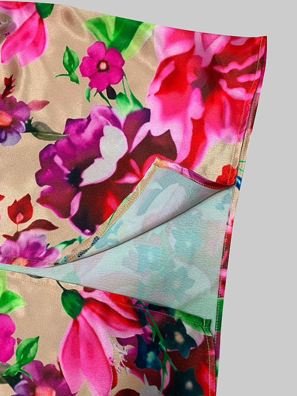 Robe longue trapèze à manches mi-longues et col en V, avec imprimé floral et fente sur le devant 