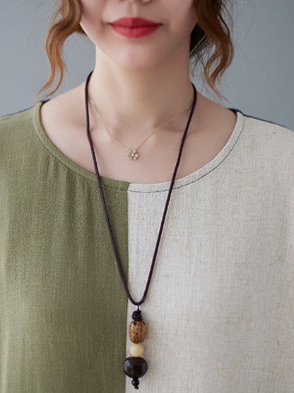 Robes mi-longues amples à manches mi-longues et col rond de couleur contrastée 