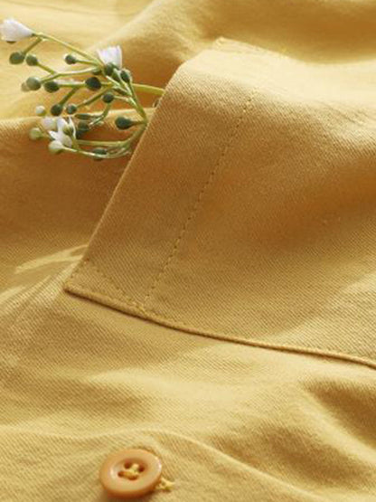 Chemises à manches longues et revers de couleur unie 