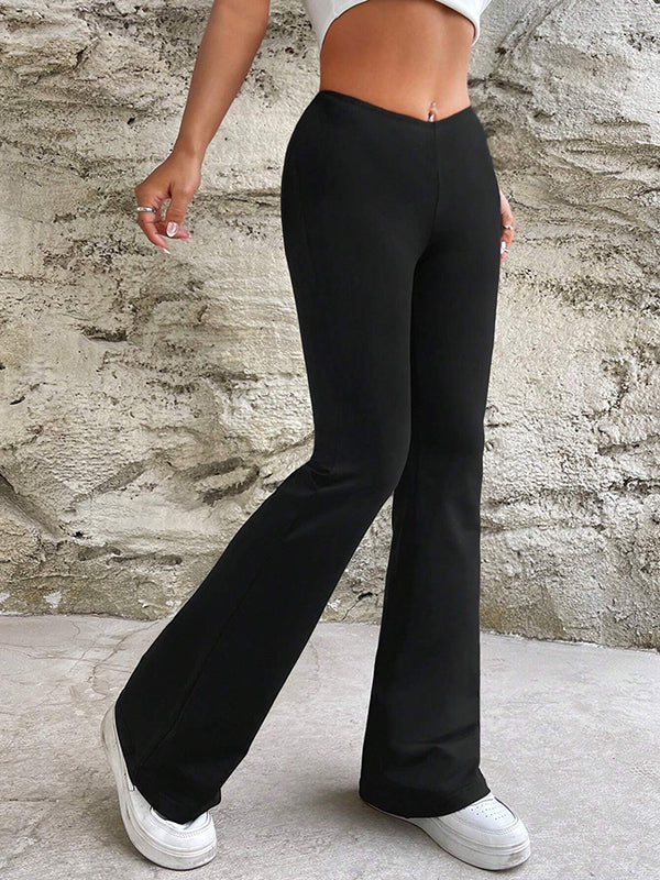 Pantalon taille haute à jambes larges de couleur unie 