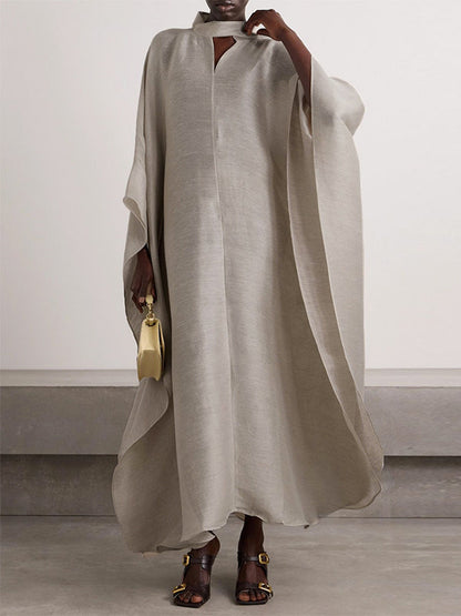 Robe longue ample à manches chauve-souris et col montant de couleur unie 