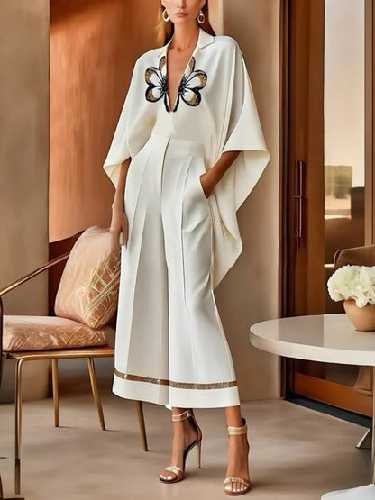 Einfarbige Hose mit weiten Beintaschen 