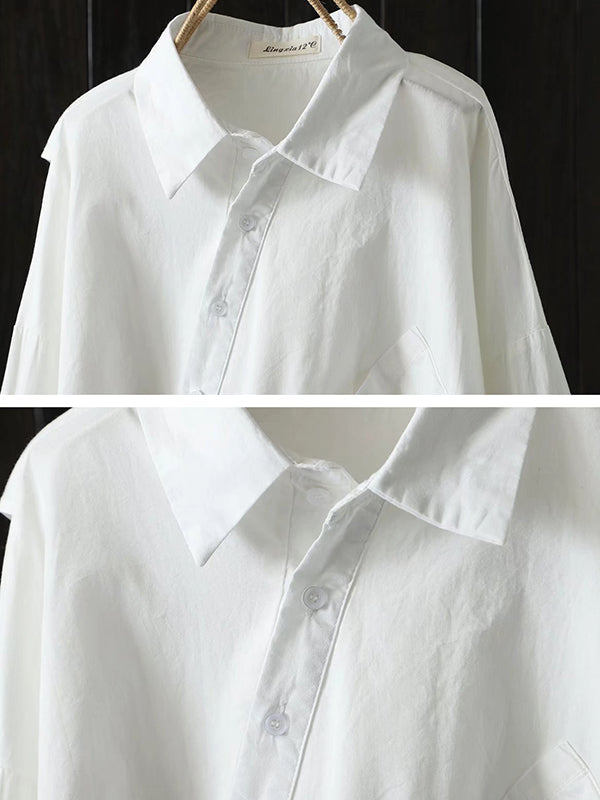 Chemisier ample noir et blanc à manches longues et coupe irrégulière 