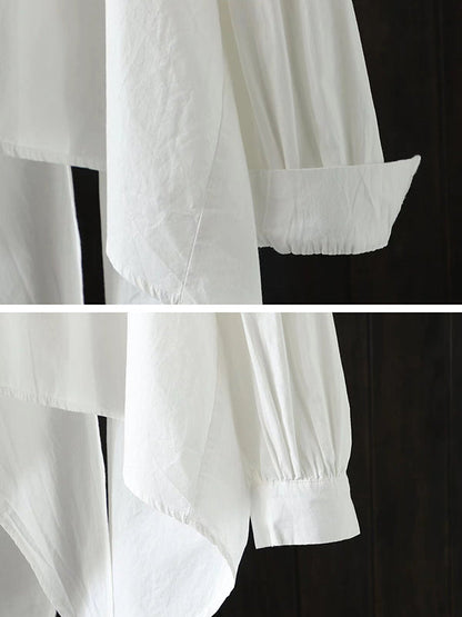 Chemisier ample noir et blanc à manches longues et coupe irrégulière 