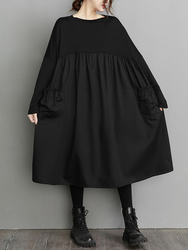 Einfaches, lockeres, schwarzes Midikleid mit Schlitz und langen Ärmeln 