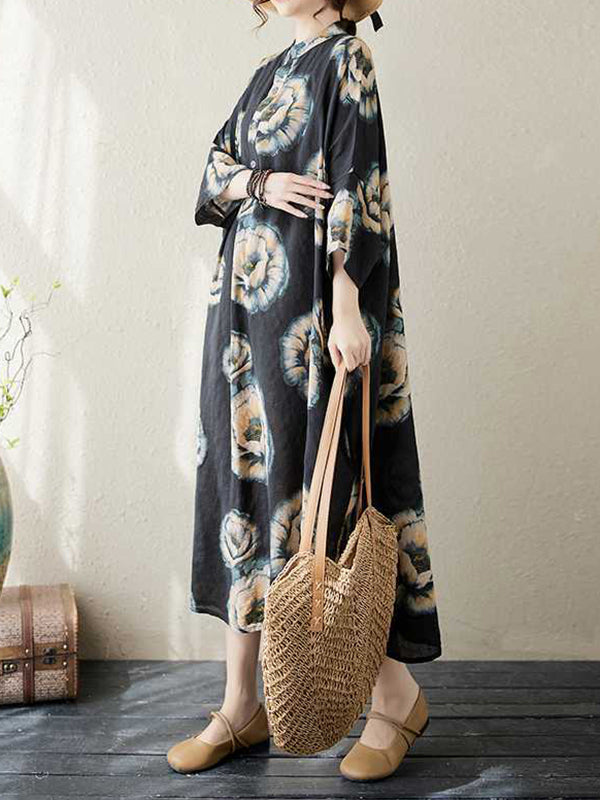 Robe mi-longue ample à manches trois-quarts et col montant, boutonnée et imprimée de fleurs 
