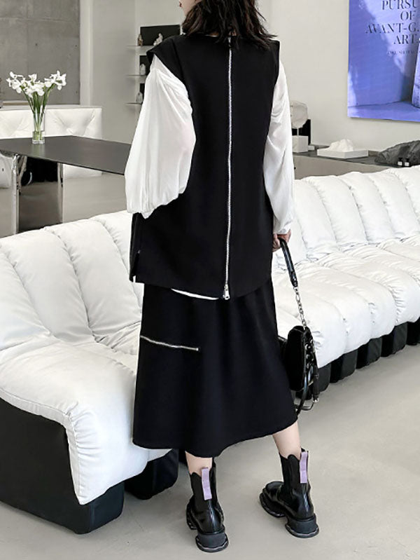 Débardeur ample sans manches à col rond et fermeture éclair asymétrique 