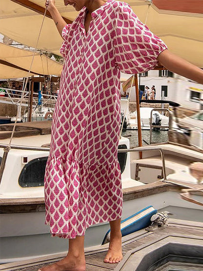 Robe mi-longue ample à manches mi-longues et col montant, imprimée et boutonnée 