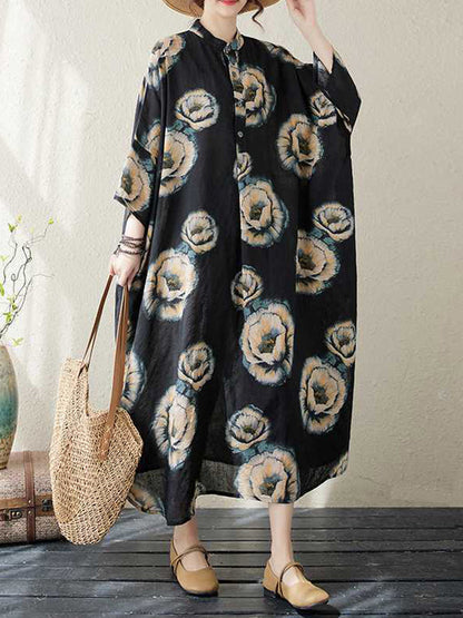 Robe mi-longue ample à manches trois-quarts et col montant, boutonnée et imprimée de fleurs 