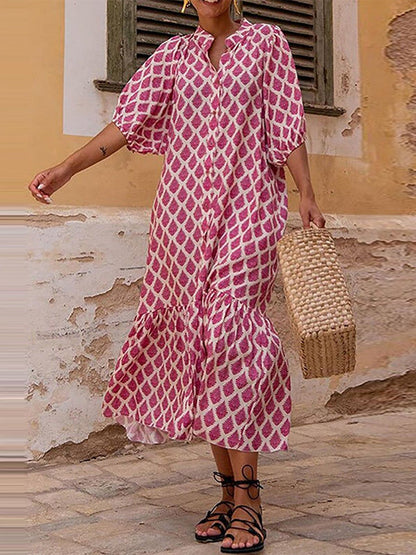 Robe mi-longue ample à manches mi-longues et col montant, imprimée et boutonnée 