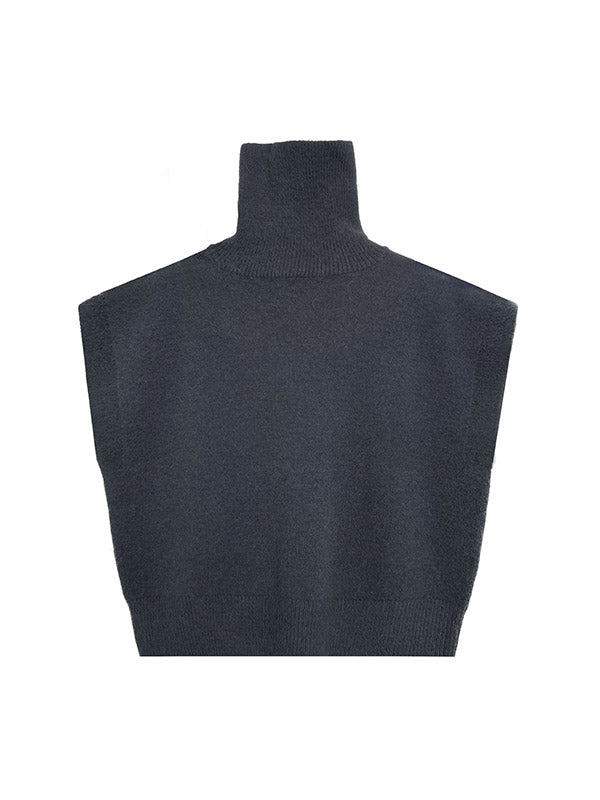 Haut sans manches ample à col montant et boutons 