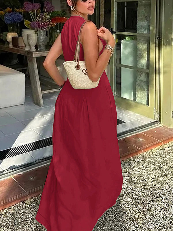 Robe longue trapèze ample à poches plissées, fermeture éclair fendue et col rond 