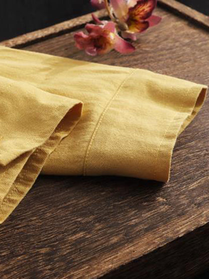 Chemises à manches longues et revers de couleur unie 