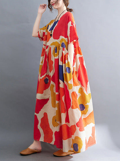 Künstlerische Retro-Kurzarm-Midikleider mit lockerem Kontrastfarbdruck und Rundhalsausschnitt 