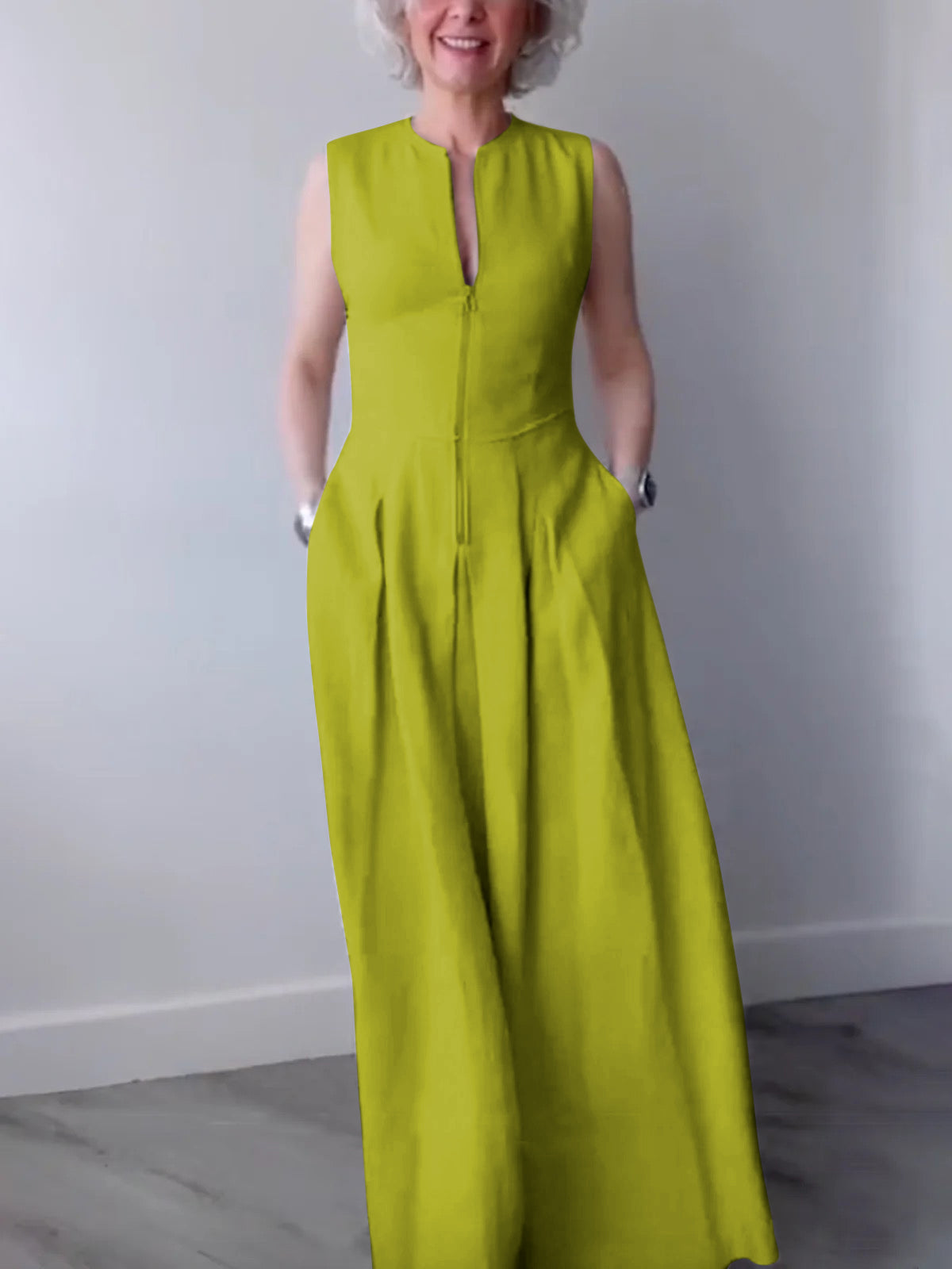 Robe longue trapèze ample à poches plissées, fermeture éclair fendue et col rond 