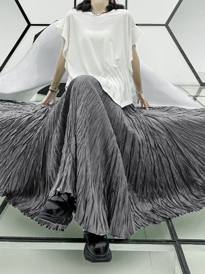 Jupes trapèze plissées taille haute à coupe irrégulière de couleur unie 