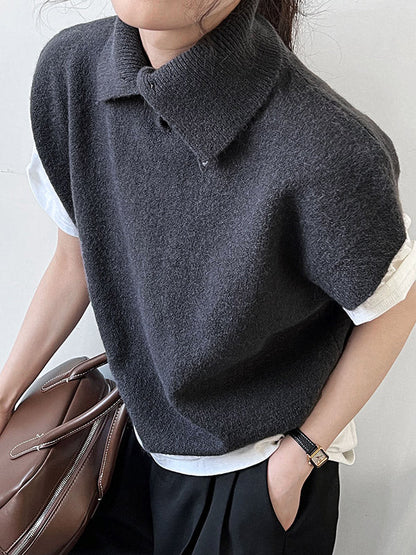 Haut sans manches ample à col montant et boutons 