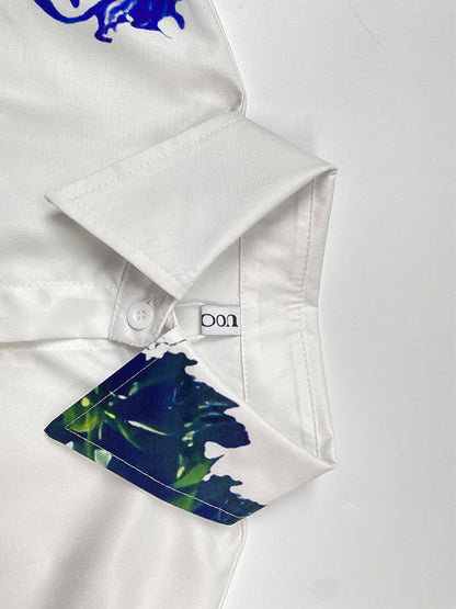 Chemisiers et chemises à manches longues, boutonnés, imprimés de fleurs, poches, col montant fendu sur le côté 