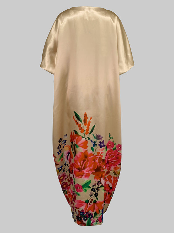 Robe longue trapèze à manches mi-longues et col en V, avec imprimé floral et fente sur le devant 