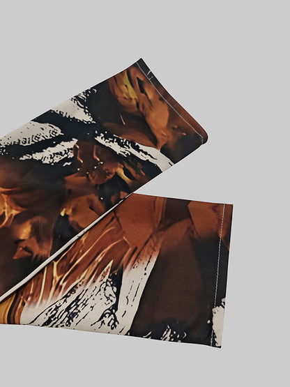 Langärmliger, lockerer Jumpsuit mit Blumenmuster, Plissee und geteiltem V-Ausschnitt 