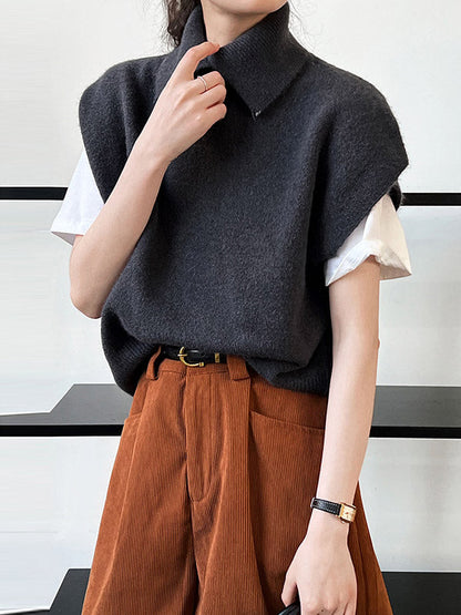 Haut sans manches ample à col montant et boutons 