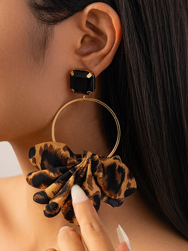 Boucles d'oreilles pendantes géométriques léopard en trois dimensions 