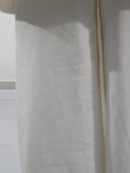 Pantalon taille haute ample boutonné de couleur unie 