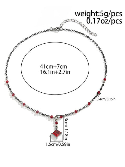 Colliers à pompons géométriques et accessoires 